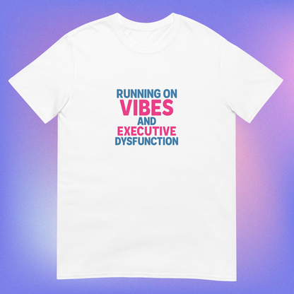 White t-shirt with blue and pink text reading 'Running on vibes and executive dysfunction' on purple gradient background