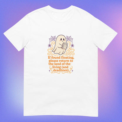 White T-Shirt with cute ghost holding a to-do list, surrounded by orange swirls, purple spiderwebs and spiders, with orange text reading 'If found floating, please return to the land of the living (and deadlines)'